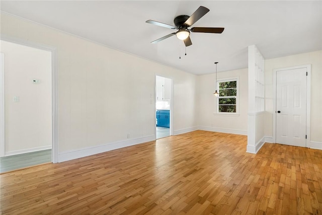 spare room with ceiling fan and light hardwood / wood-style flooring