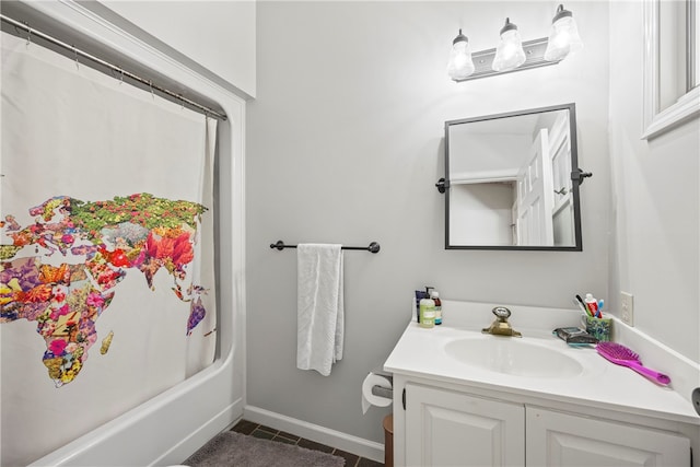 bathroom with tile patterned flooring, vanity, and shower / bath combo with shower curtain