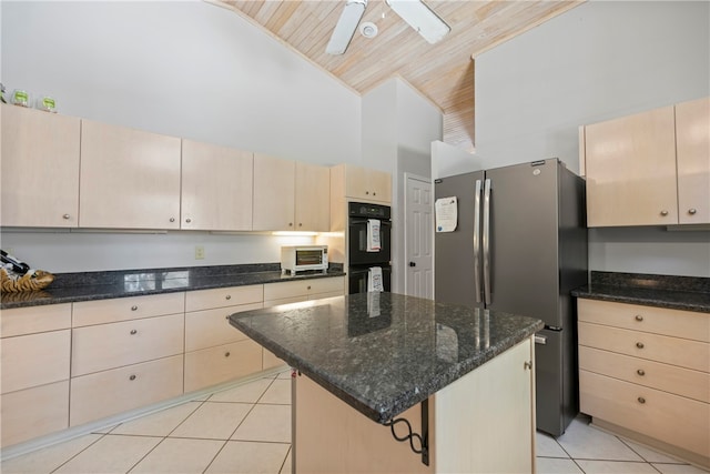 kitchen featuring a center island, wooden ceiling, high vaulted ceiling, ceiling fan, and stainless steel fridge