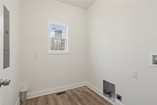 washroom featuring electric dryer hookup, dark hardwood / wood-style flooring, and hookup for a washing machine