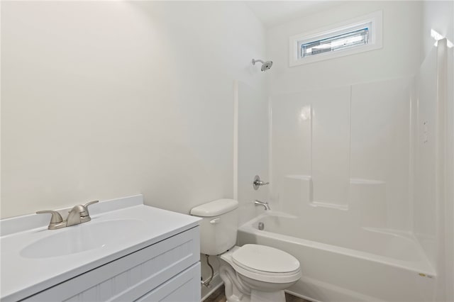 full bathroom with bathing tub / shower combination, vanity, and toilet