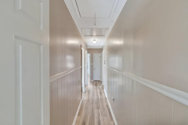 hallway with light wood-type flooring