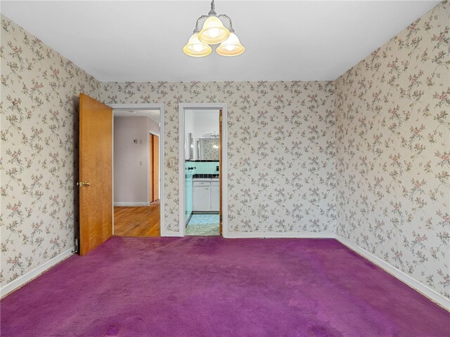 empty room with carpet flooring