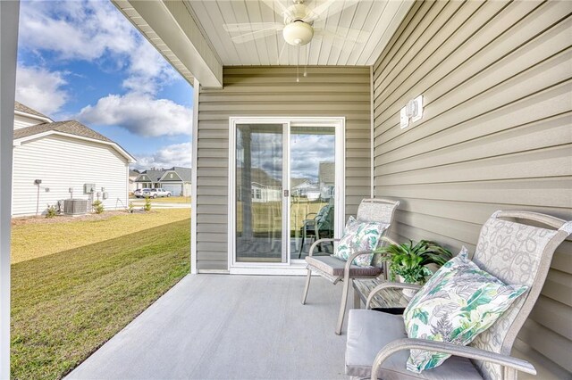 view of patio / terrace featuring cooling unit and ceiling fan