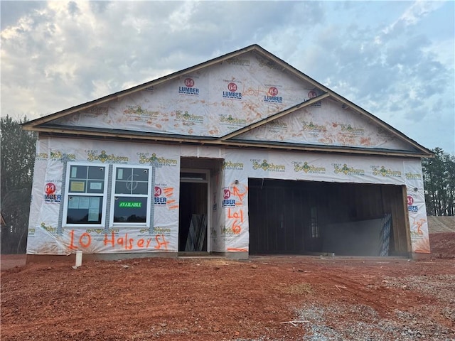 property under construction featuring a garage