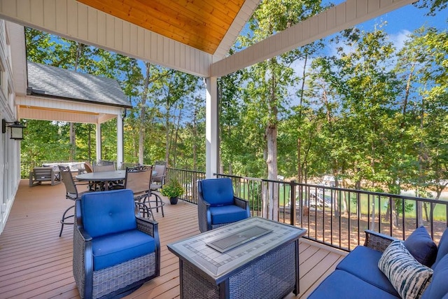 wooden deck with outdoor lounge area