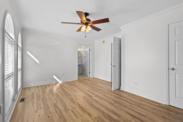 unfurnished bedroom with connected bathroom, light hardwood / wood-style floors, ceiling fan, and ornamental molding