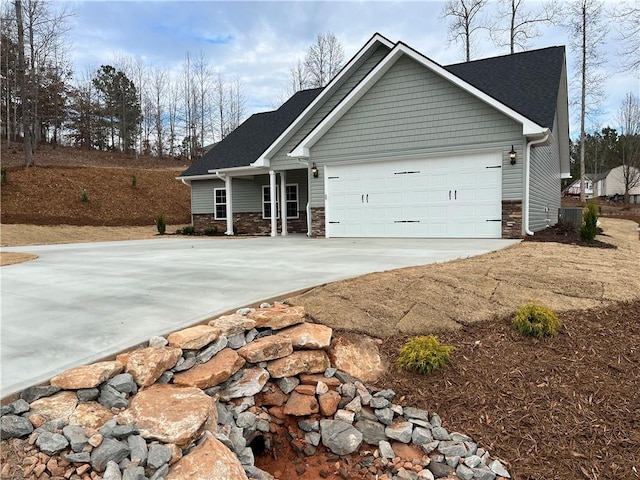 craftsman-style home featuring a garage