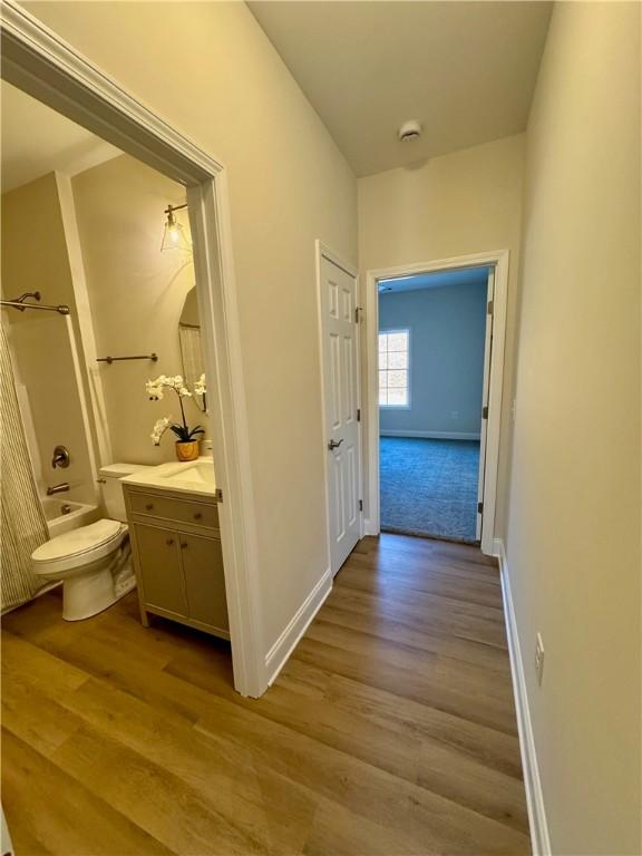 hallway featuring light hardwood / wood-style floors