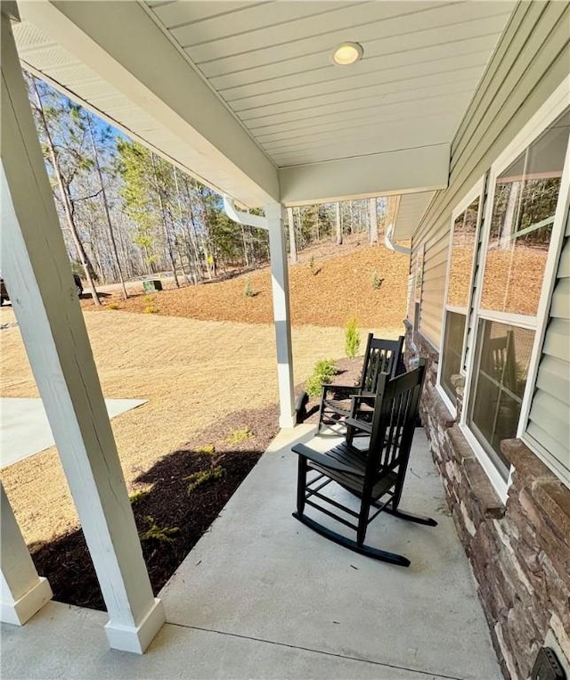 view of patio featuring covered porch