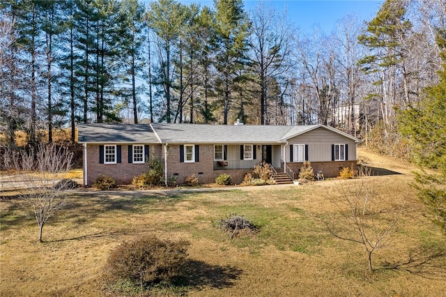 single story home featuring a porch and a front yard