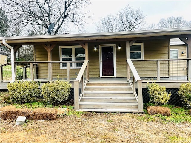 view of front of home featuring covered porch