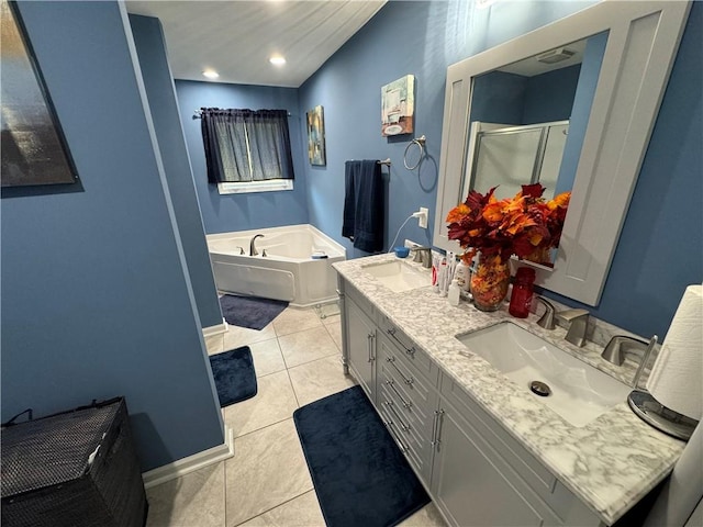 bathroom with shower with separate bathtub, vanity, and tile patterned floors