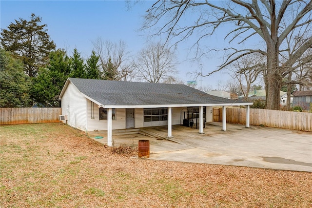 exterior space featuring a carport