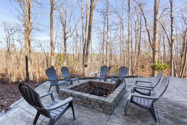 view of patio featuring an outdoor fire pit