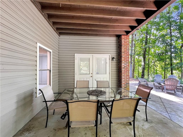 view of patio featuring french doors