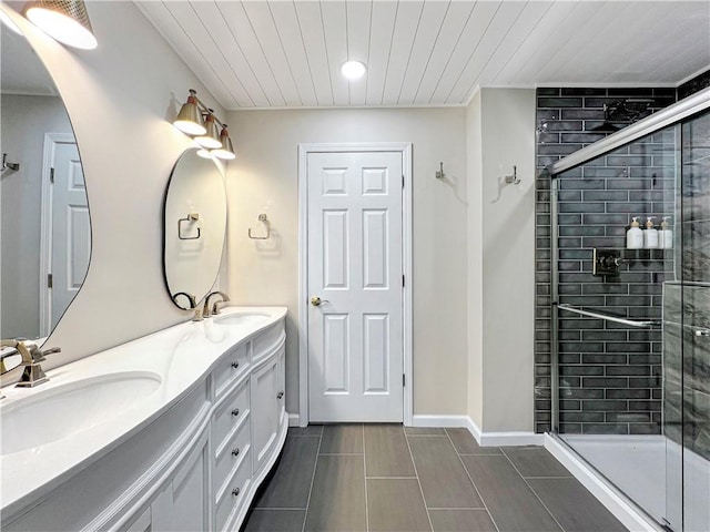 bathroom with vanity and walk in shower