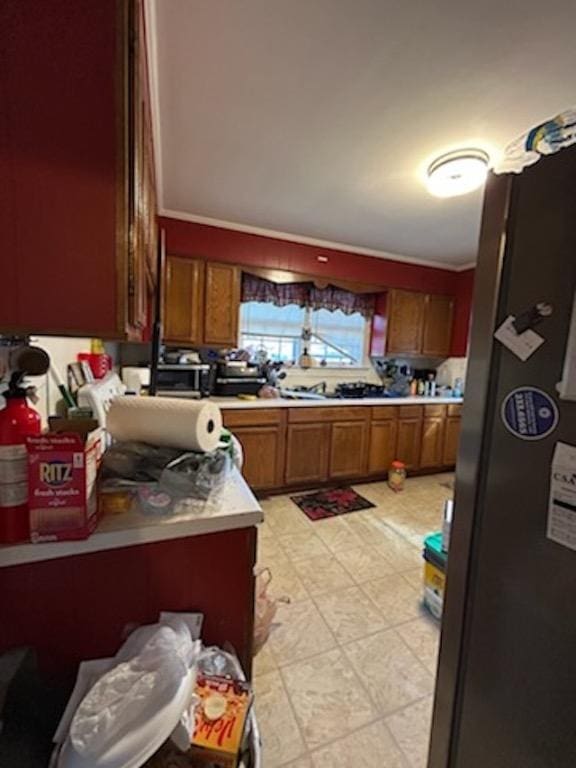 kitchen featuring crown molding