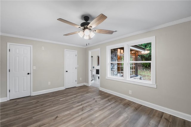 unfurnished room with hardwood / wood-style floors, ceiling fan, and ornamental molding