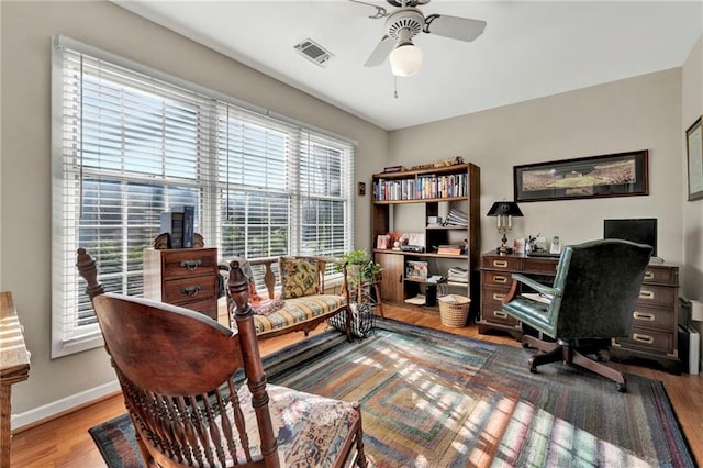 office featuring ceiling fan and wood-type flooring