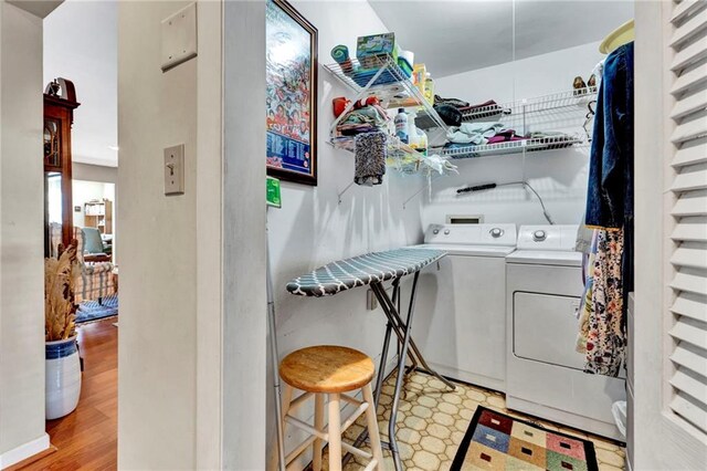 laundry room with washer and clothes dryer