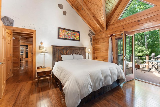 bedroom with access to exterior, dark wood-type flooring, wooden walls, high vaulted ceiling, and wooden ceiling