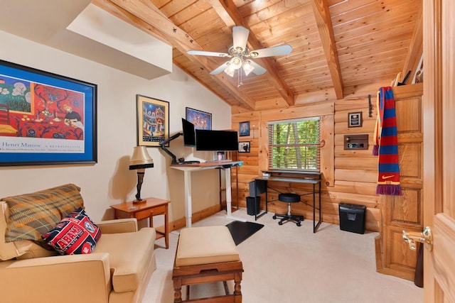 carpeted office space with ceiling fan, lofted ceiling with beams, wooden ceiling, and log walls