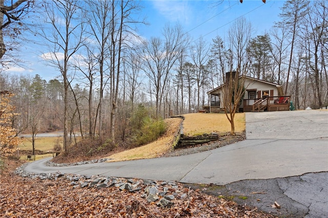 view of yard featuring a deck