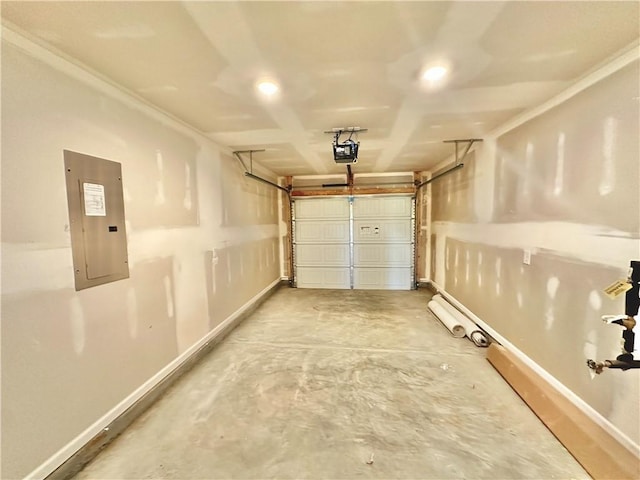 garage with a garage door opener and electric panel