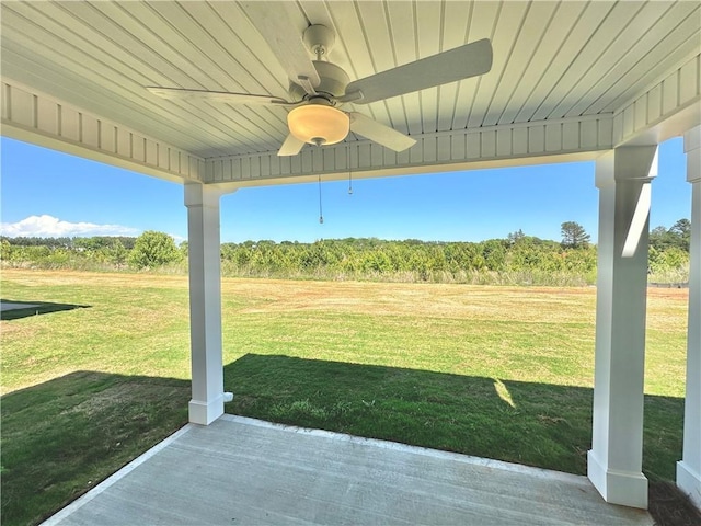 view of yard featuring ceiling fan