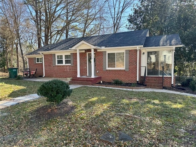 ranch-style home with a front yard