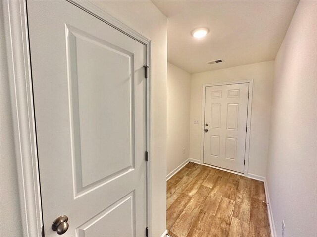 doorway featuring light hardwood / wood-style floors