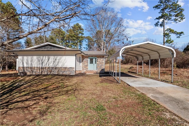 exterior space featuring a carport