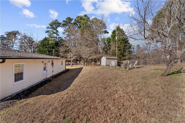 view of yard with a storage shed