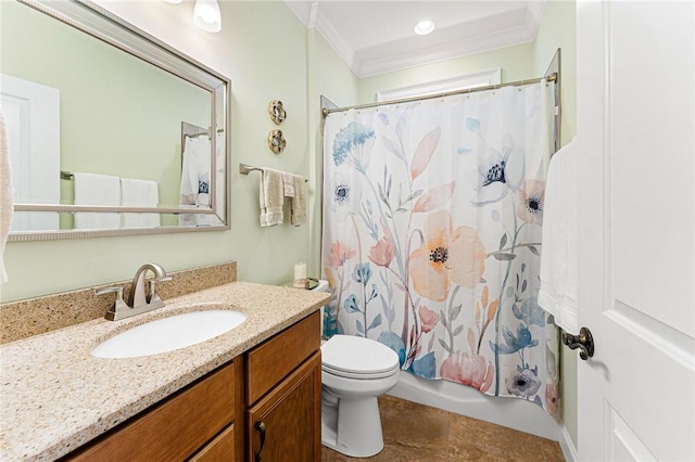 bathroom with vanity, toilet, and ornamental molding