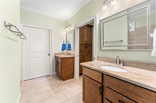 bathroom featuring tile patterned floors, vanity, and ornamental molding