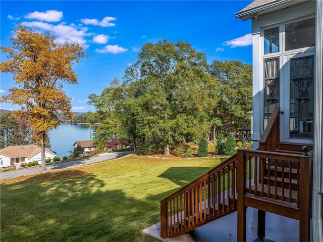 view of yard with a water view