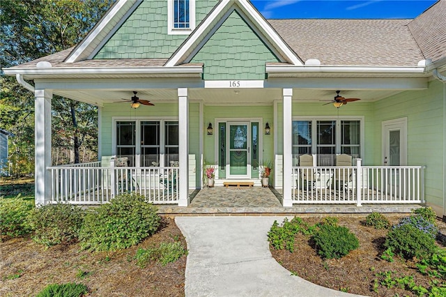 view of front facade featuring ceiling fan and covered porch