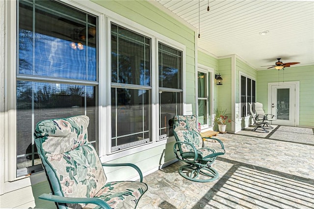 view of patio featuring a porch and ceiling fan