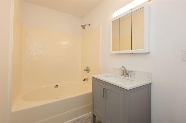 bathroom featuring vanity and washtub / shower combination