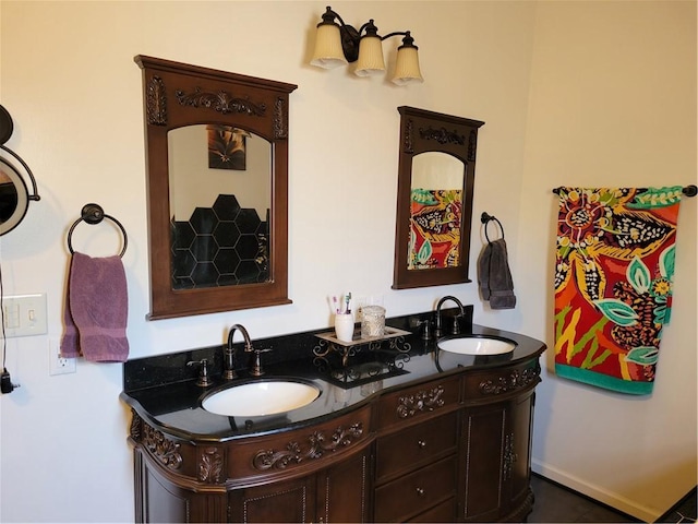 bathroom with double vanity and a sink