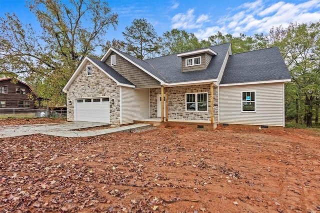 craftsman inspired home with a porch and a garage