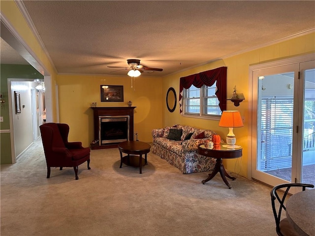 living room with light carpet, ceiling fan, and crown molding