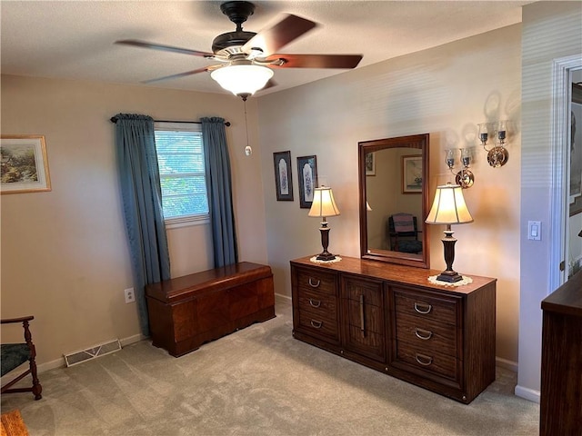 interior space featuring ceiling fan