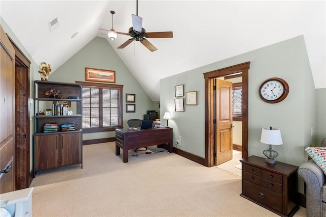 home office with ceiling fan, lofted ceiling, and light carpet