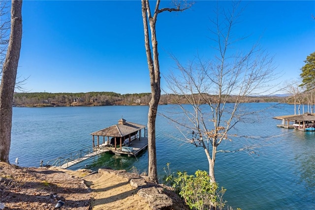 dock area featuring a water view