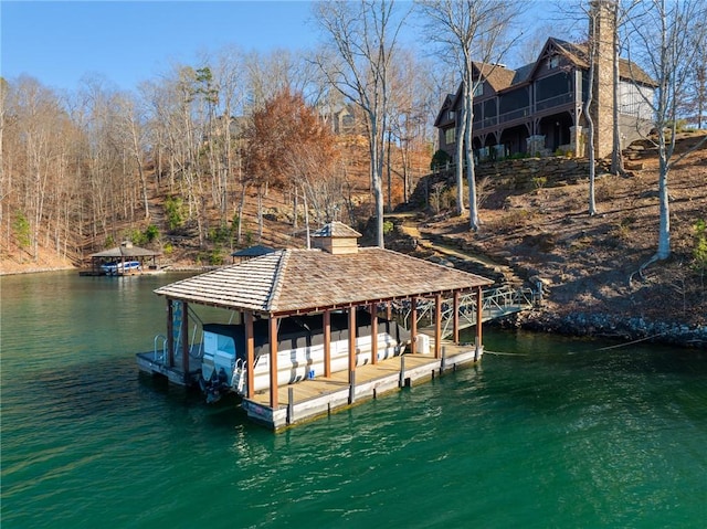 view of dock with a water view