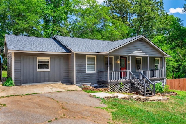 single story home with a porch