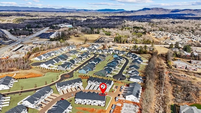 bird's eye view with a mountain view