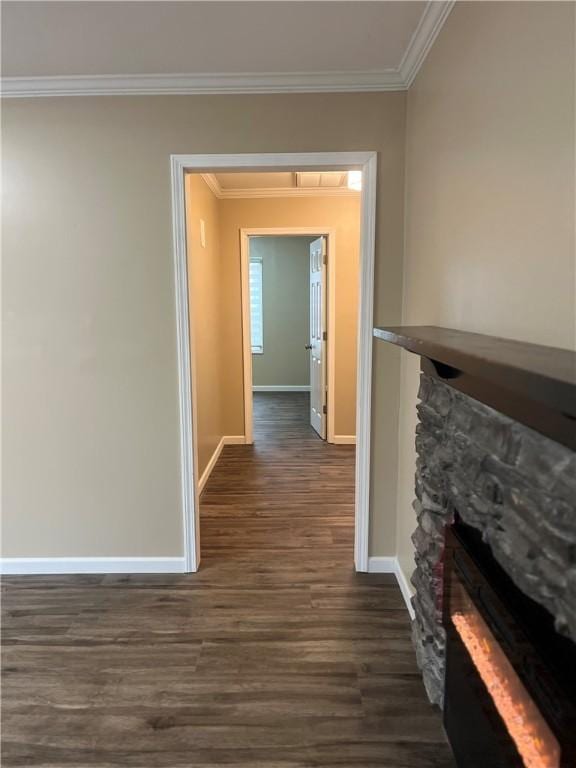 hall with dark hardwood / wood-style flooring and ornamental molding